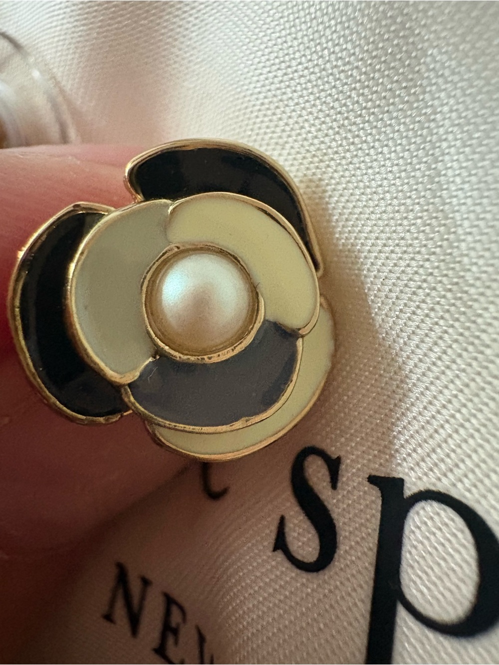 Gleaming gardenia by Kate Spade